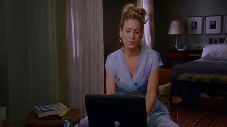 Sex and the City character Carrie Bradshaw entering her living room