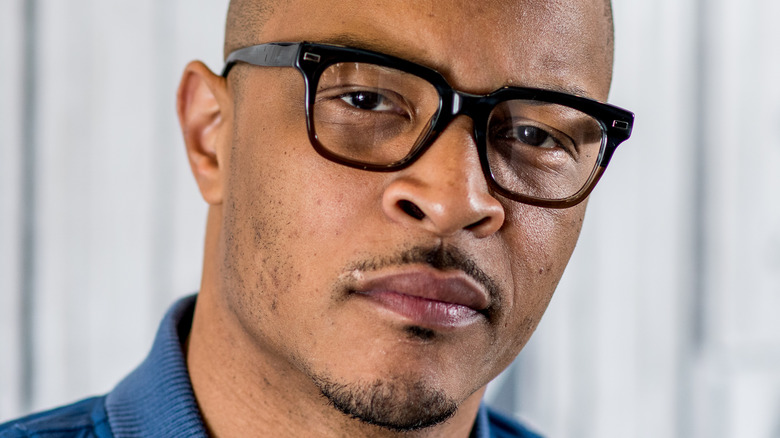 T.I. with a serious expression