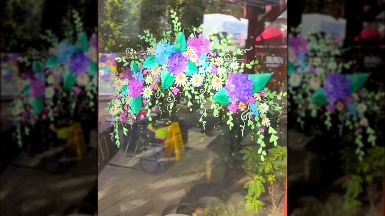 Floral arch painted onto a window