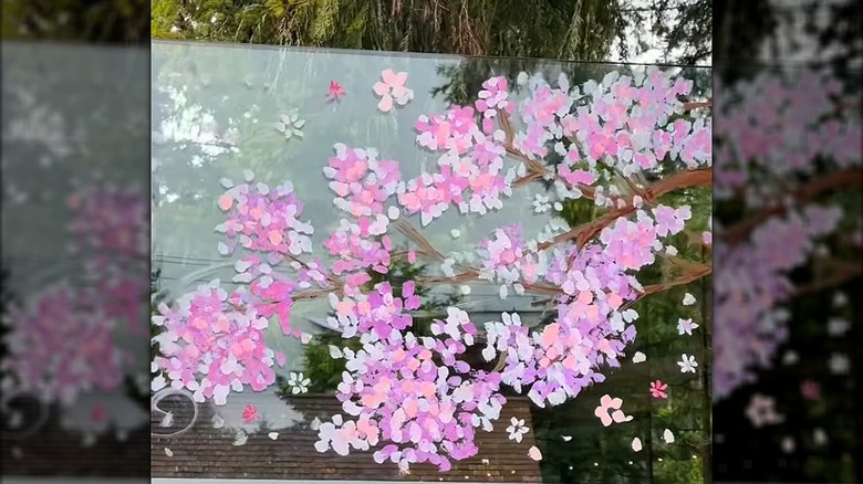 Cherry blossom tree branch painted onto glass
