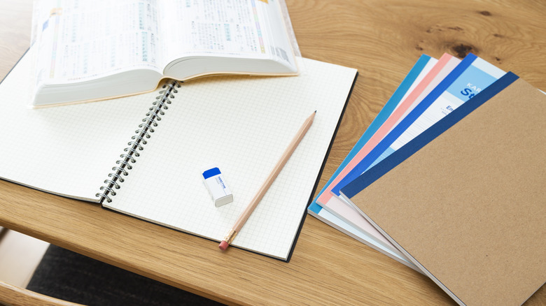 Papers and homework on table