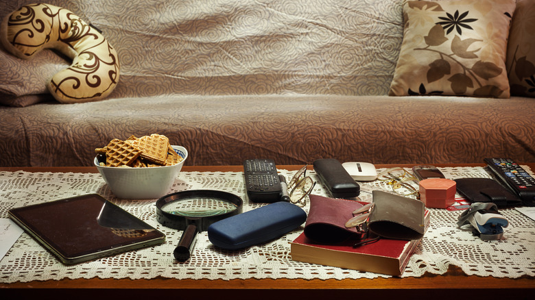 coffee table with miscellaneous items from around the house