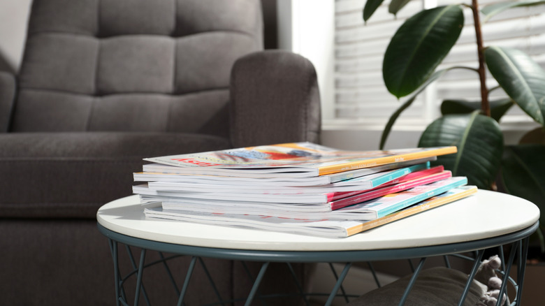 pile of magazines on coffee table