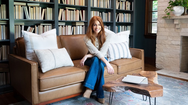 Jenn Todryk sitting on couch