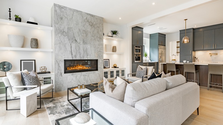 living room with marble fireplace