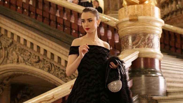 Lily Collins in Emily in Paris on stairs