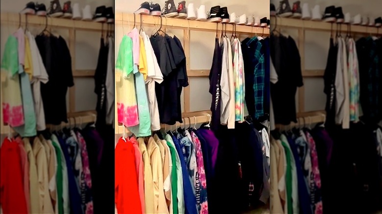 Clothing hung on box spring frame