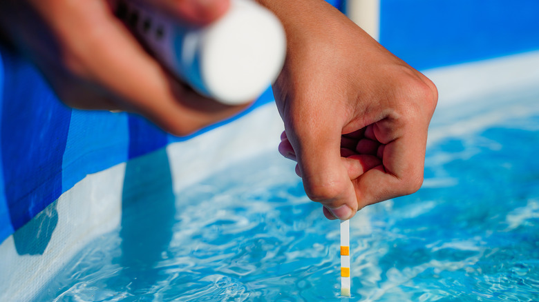 Testing chlorine levels in a pool