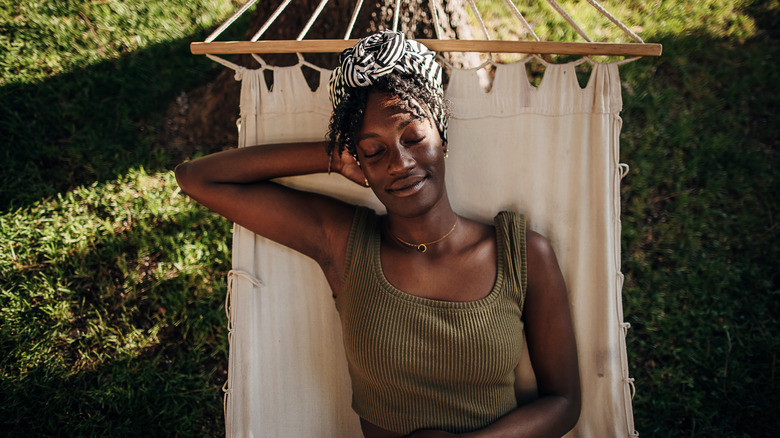 happy woman in a hammock