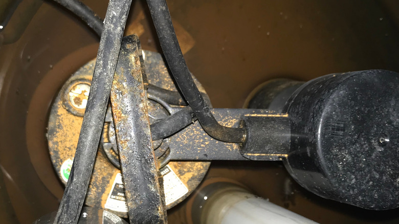 Old sump pump in a pit