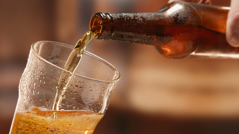 beer pouring from bottle