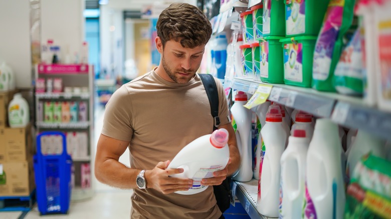 Man shopping for laundry bleach