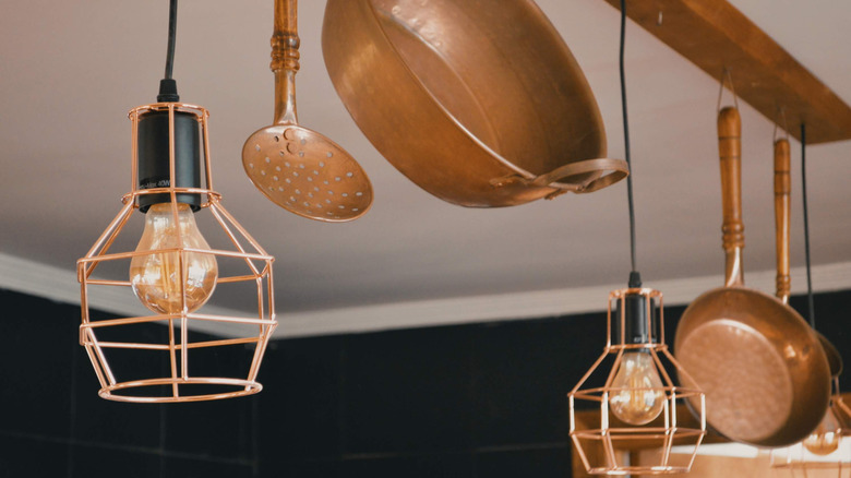 copper light and pots in kitchen
