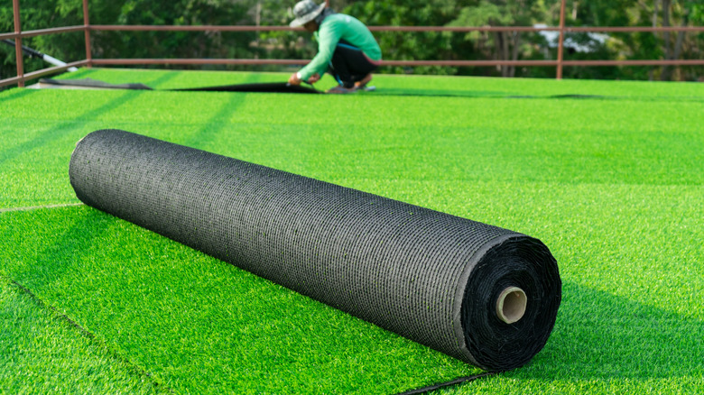 Roll of artificial turf on a large-sized layout