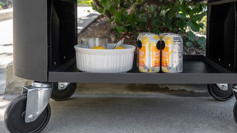 bottom of Permasteel drink cart showing shelf