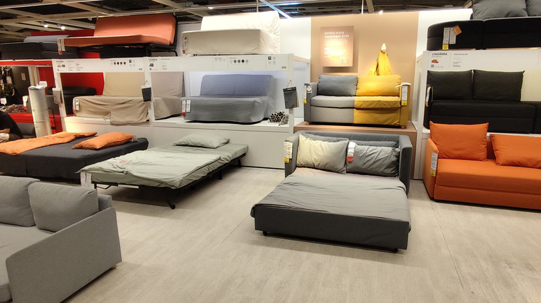 Various IKEA sofa beds in a show room