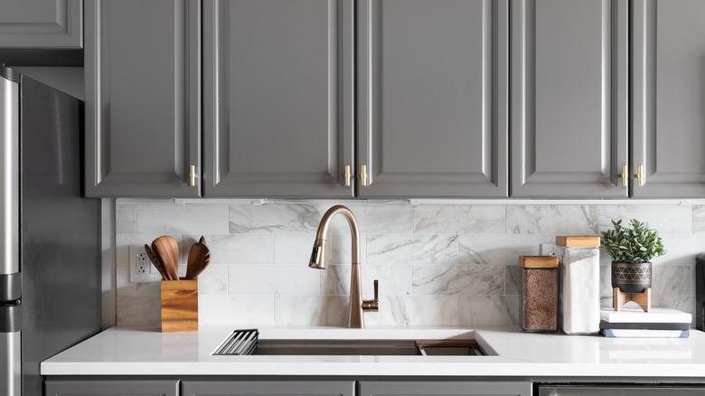 Kitchen with grey cabinets