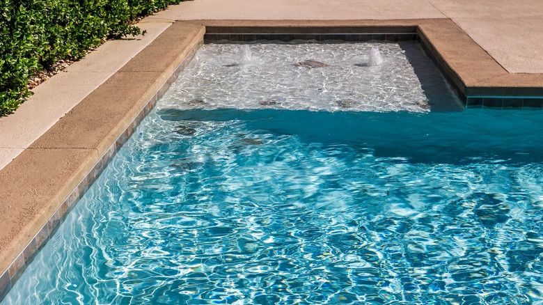 A rectangular swimming pool 
