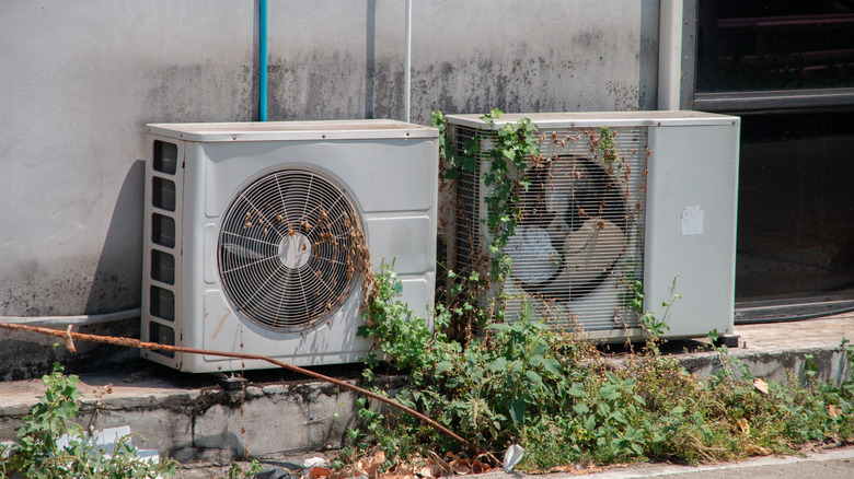 Two dirty outdoor AC units