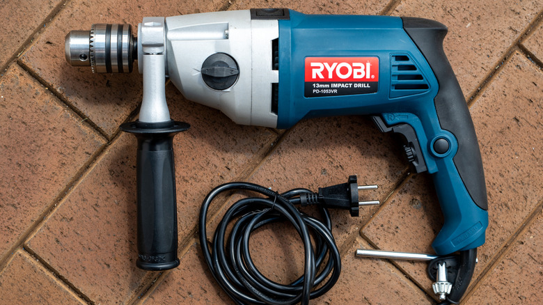 A discontinued Ryobi corded hammer drill