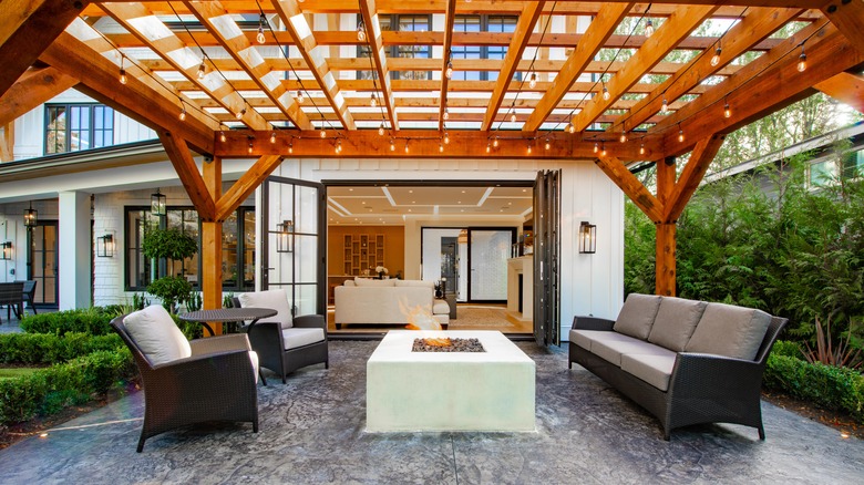 pergola with fire pit beneath