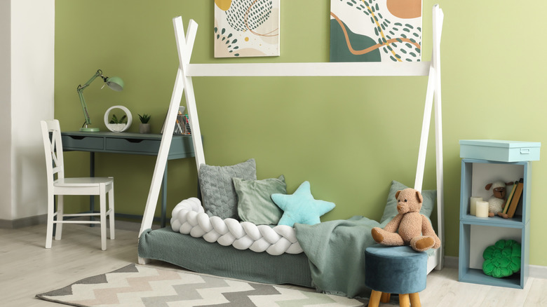 Toddler room with tent-like floor bed