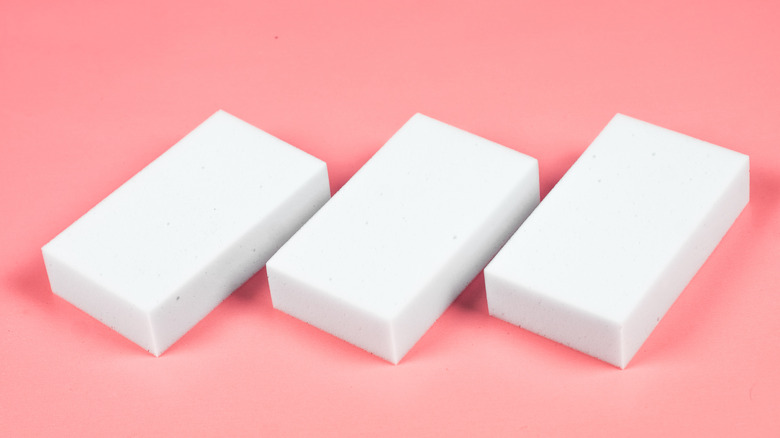 three magic erasers pink background