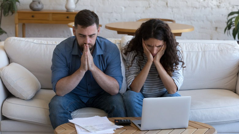 Frustrated young home buyers