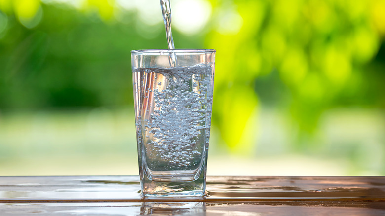Water being poured into a glass