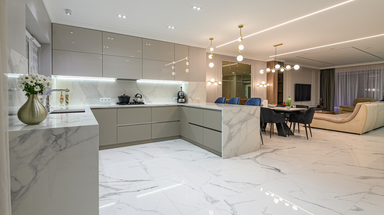 White marble kitchen with dining room