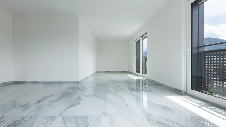 Interior of empty apartment with marble floor