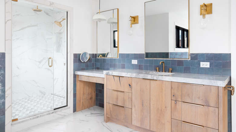 marble and wood combo bathroom