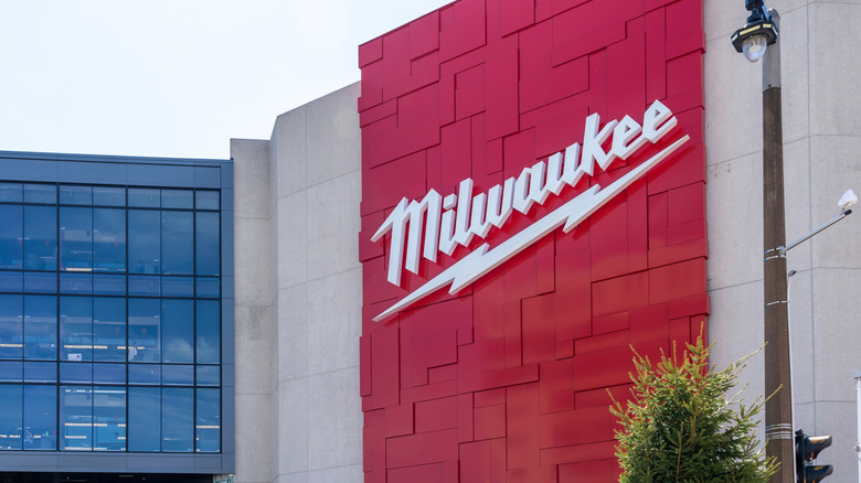 An image of the Milwaukee brand logo on the company's building in Milwaukee, Wisconsin