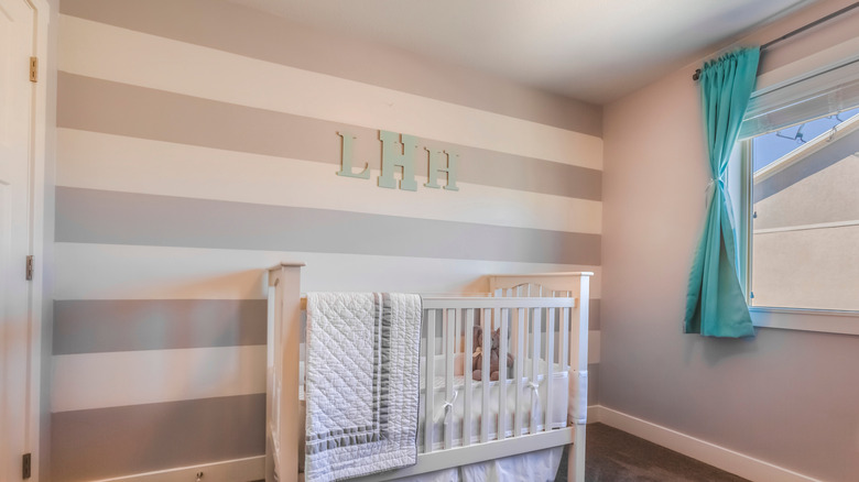 Baby's room with monogrammed wall