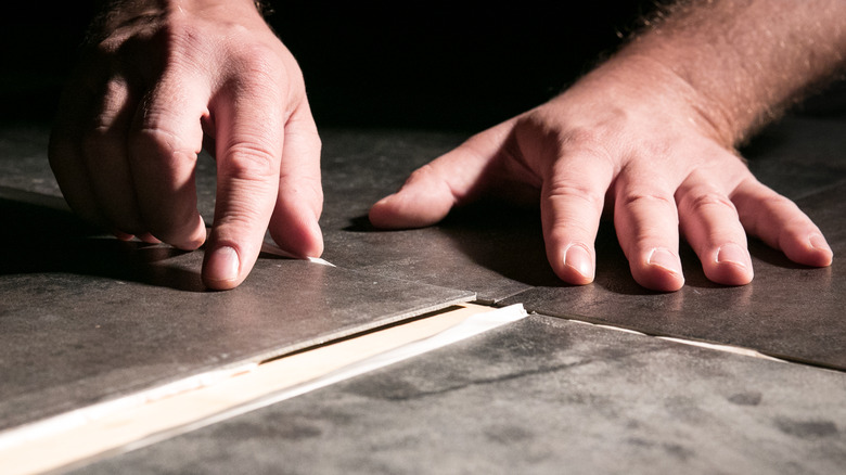 Placement of self-stick tiles