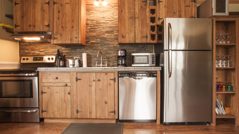 dishwasher next to fridge