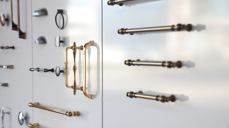 Selection of ornate cabinet hardware in a store