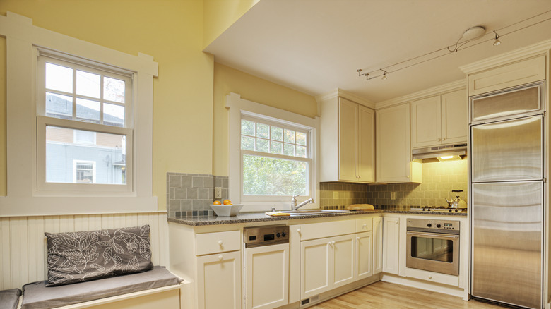 A classic kitchen with butter yellow walls