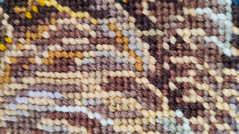 Close up of rug knotting