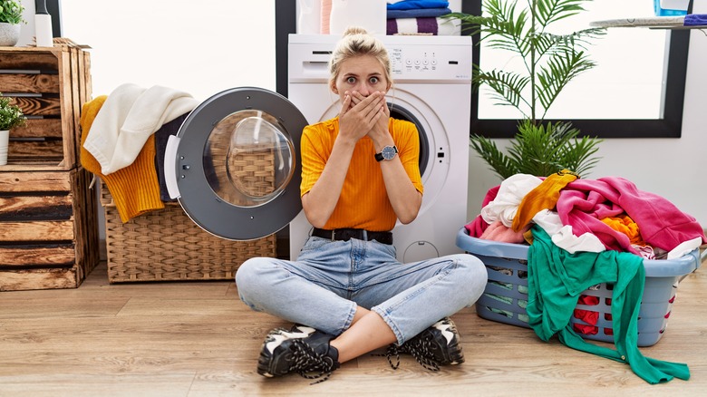 women looking upset at laundry