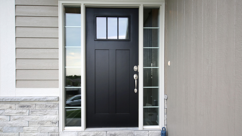 Home with black front door