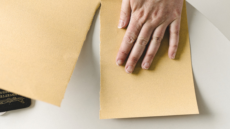 Someone tearing their sandpaper