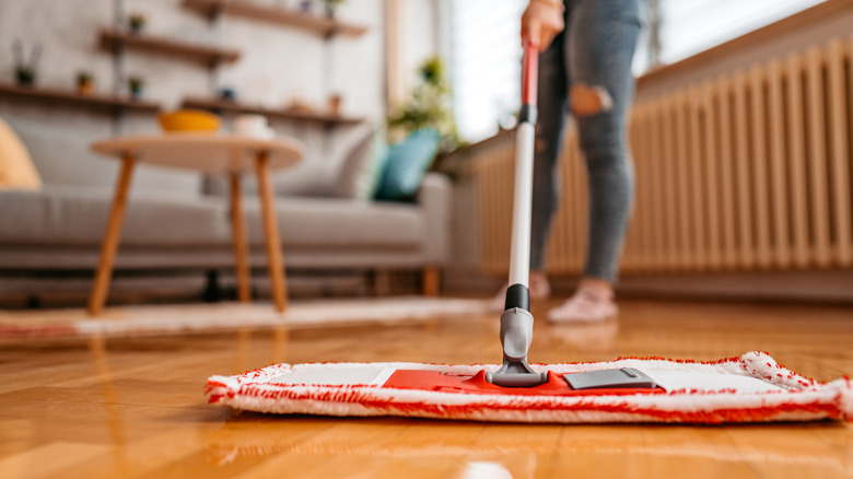 Mopping a wood floor