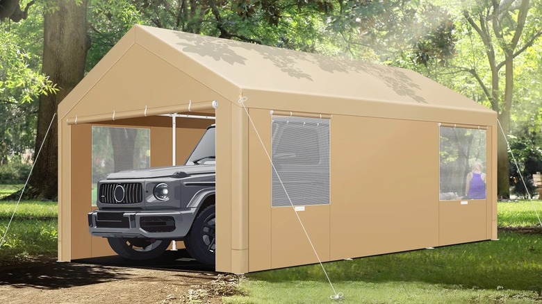 Truck parked inside a fabric carport