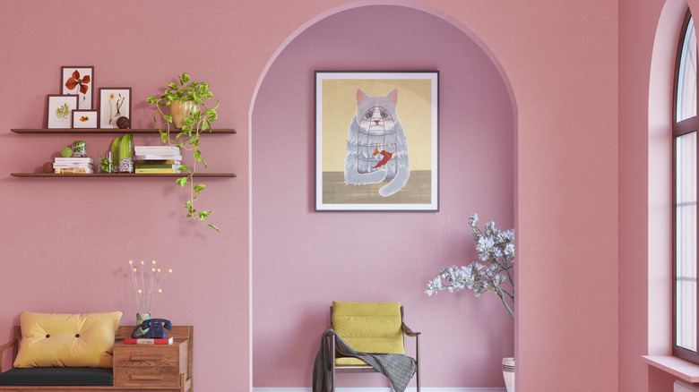 A pink room featuring unique decor