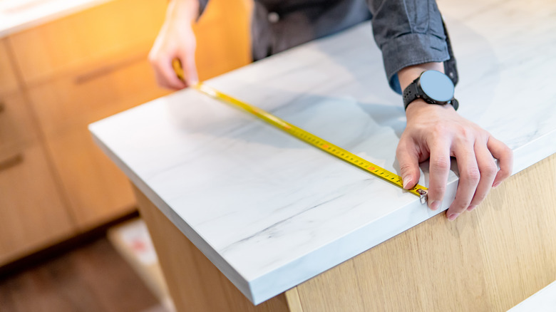 tape measuring kitchen island