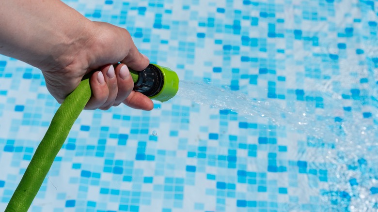 Filling pool with hose
