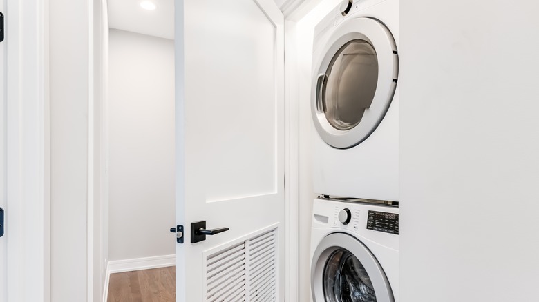 Stackable washer-dryer units inside closet