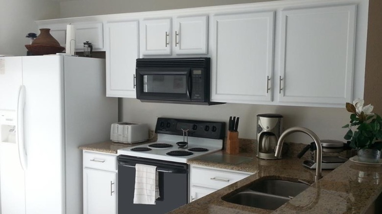 Melamine kitchen cabinets painted with Cabinet Rescue melamine laminate paint