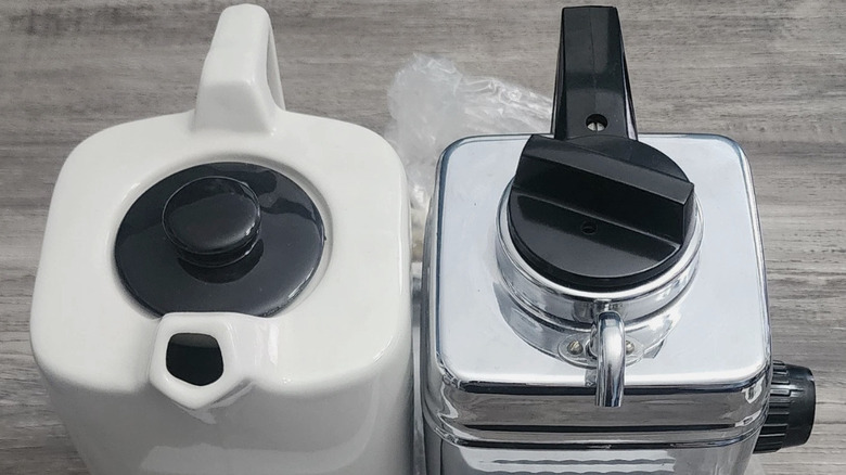 A close up image of the kettle and teapot of a vintage Teasmade